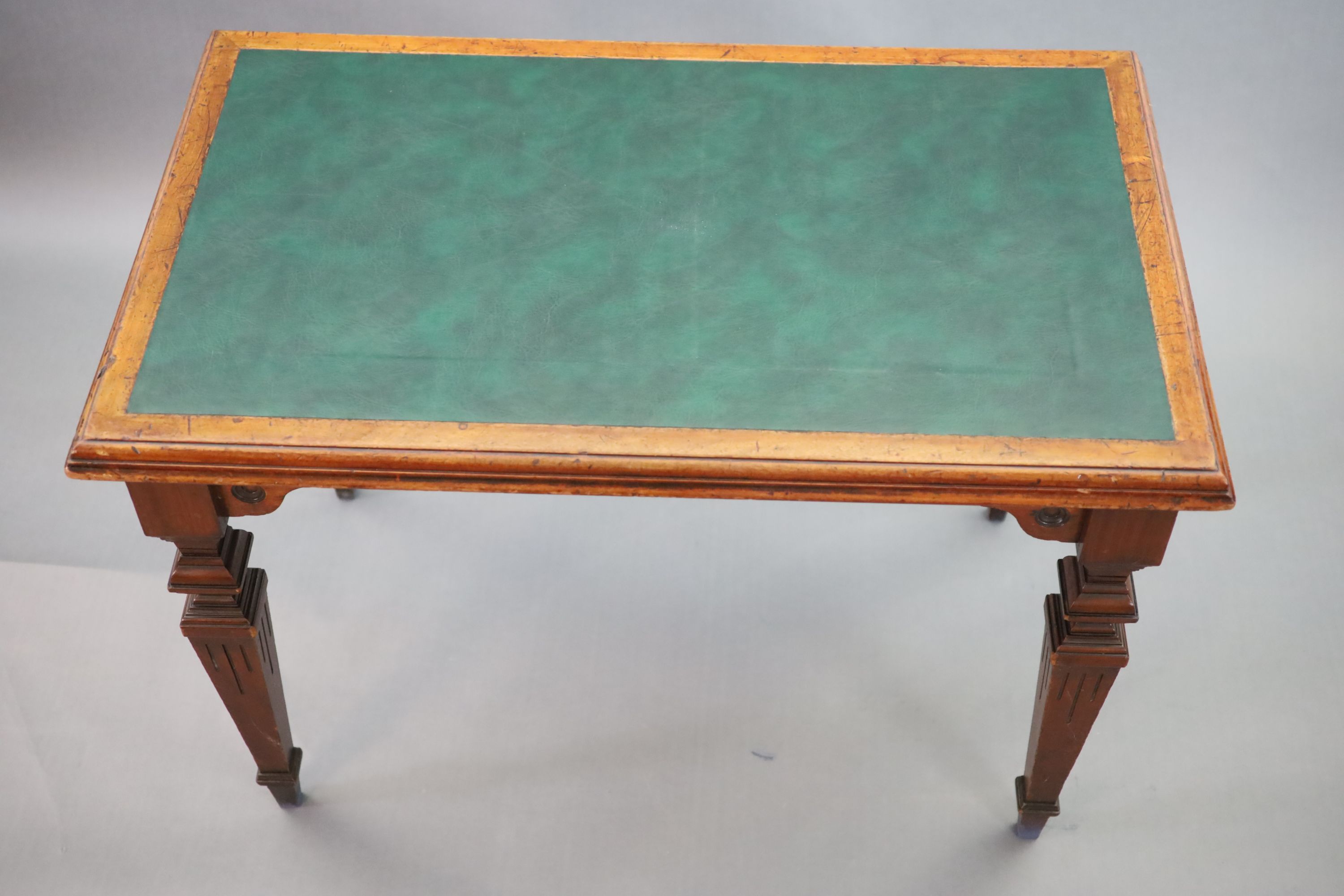 A Victorian mahogany library table, supplied by Sage & Co. Shopfitters of London, W.113cm D.69cm H.78cm